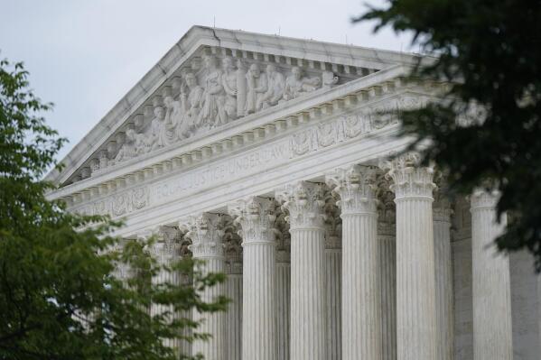 FILE - The U.S. Supreme Court building in Washington, Monday, June 27, 2022. The Supreme Court has temporarily blocked a court order that would have forced Yeshiva University to recognize an LGBTQ group as an official campus club. The court acted Friday, Sept. 9, in a brief order signed by Justice Sonia Sotomayor that indicated the court would have more to say on the topic at some point. (AP Photo/Patrick Semansky, File)