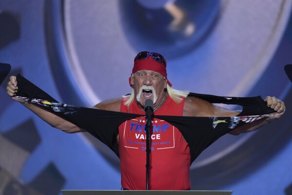 Hulk Hogan tears off his shirt while speaking on the final night of the Republican National Convention on Thursday, July 18, 2024, in Milwaukee. (AP Photo/J. Scott Applewhite)