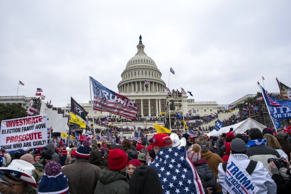 Rioters loyal to President Donald Trump rally at the U.S. Capitol in Washington, Jan. 6, 2021. (AP Photo/Jose Luis Magana, File)