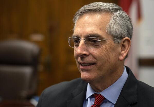 Georgia Secretary of State Brad Raffensperger discusses his new book, "Integrity Counts," during an interview on Thursday, Oct. 28, 2021, in Atlanta. In the book, Raffenseperger speaks out against former President Donald Trump's claims of voter fraud in the 2020 election. (AP Photo/Ron Harris)