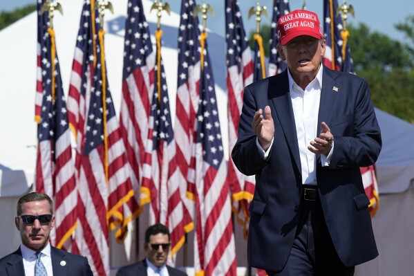 Republican presidential candidate former President Donald Trump arrives at a campaign rally in Chesapeake, Va., Friday, June 28, 2024. (AP Photo/Steve Helber)