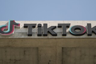 FILE - A TikTok sign is displayed on their building in Culver City, Calif., March 11, 2024. If it feels like TikTok has been around forever, that's probably because it has, at least if you're measuring via internet time. What's now in question is whether it will be around much longer — and if so, in what form. (AP Photo/Damian Dovarganes, File)