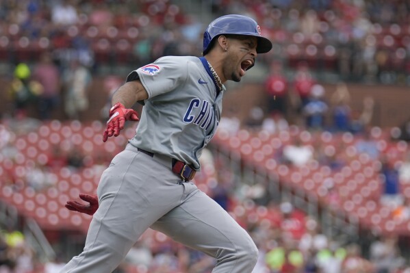Chicago Cubs' Christopher Morel rounds the bases after hitting a solo home run during the eighth inning of a baseball game against the St. Louis Cardinals Sunday, July 14, 2024, in St. Louis. (AP Photo/Jeff Roberson)