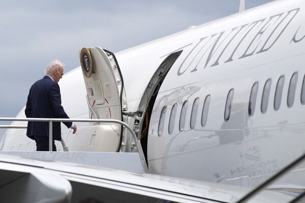 President Joe Biden boards Air Force One at LaGuardia International Airport, Saturday, June 29, 2024, in New York. (AP Photo/Evan Vucci)