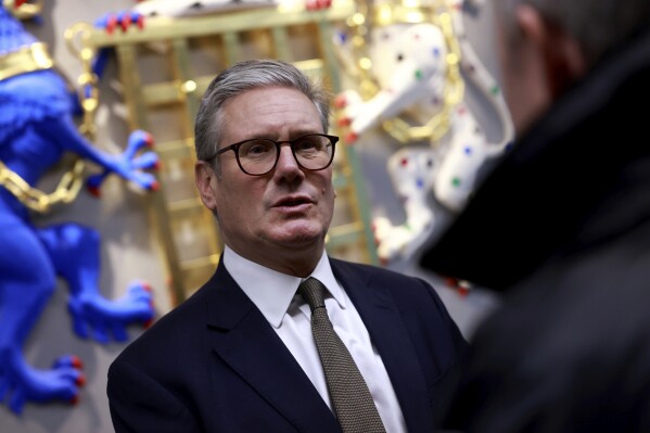 Britain's Prime Minister Keir Starmer speaks during a visit at the National Crime Agency (NCA) headquarters in London, Friday, Sept. 6, 2024. (Benjamin Cremel/Pool via AP)