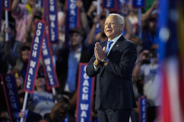 Democratic vice presidential nominee Minnesota Gov. Tim Walz speaks during the Democratic National Convention Wednesday, Aug. 21, 2024, in Chicago. (AP Photo/Charles Rex Arbogast)