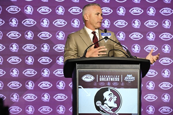 Florida State head coach Mike Norvell speaks during the Atlantic Coast Conference NCAA college football media days, Monday, July 22, 2024, in Charlotte, N.C. (AP Photo/Matt Kelley)