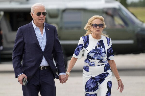 President Joe Biden, left, and first lady Jill Biden arrive on Marine One at East Hampton Airport, Saturday, June 29, 2024, in East Hampton, N.Y. (AP Photo/Evan Vucci)