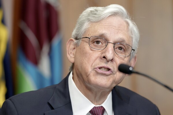 Attorney General Merrick Garland talks during a news conference on ongoing efforts to combat violent crime in cities across the United States Friday, Jan. 5, 2024, in Washington. (AP Photo/Mariam Zuhaib)