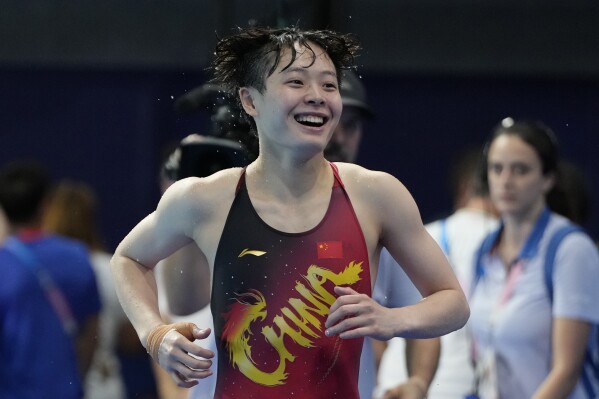 China's Chen Yiwen smiles after the women's 3m springboard diving final, at the 2024 Summer Olympics, Friday, Aug. 9, 2024, in Saint-Denis, France. (AP Photo/Lee Jin-man)