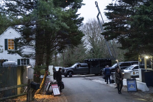 FILE - The access road to President Joe Biden's home in Wilmington, Del., is seen from the media van on Jan. 13, 2023. The Justice Department special counsel investigating President Joe Biden's handling of classified documents has completed his inquiry and a report is expected to be made public soon, Attorney General Merrick Garland told lawmakers in a letter Wednesday. (AP Photo/Carolyn Kaster, File)