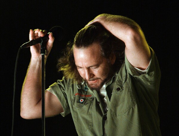FILE - Pearl Jam lead singer Eddie Vedder performs at the Bonnaroo music festival in Manchester, Tenn., June 14, 2008. In 1994 Pearl Jam filed a complaint against Ticketmaster with the Justice Department, claiming that the company used its position in the industry to stop promoters from booking the band because they railed against Ticketmaster's pricing. (AP Photo/Mark Humphrey, File)