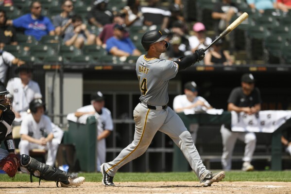 Pittsburgh Pirates' Joey Bart watches his three-run home run during the fourth inning of a baseball game against the Chicago White Sox, Sunday, July 14, 2024, in Chicago. (AP Photo/Paul Beaty)