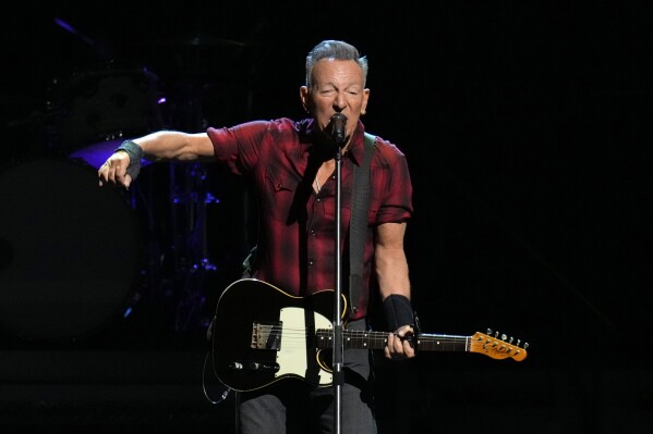 Bruce Springsteen sings on stage during his concert of Bruce Springsteen and The E Street Band World Tour 2024 performance Tuesday, March 19, 2024, in Phoenix. (AP Photo/Ross D. Franklin)