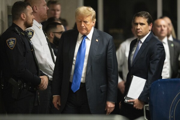 Former President Donald Trump walks outside of Manhattan Criminal Court after a jury convicted him of felony crimes for falsifying business records in a scheme to illegally influence the 2016 election Thursday, May 30, 2024, in New York. (Steven Hirsch/New York Post via AP, Pool)