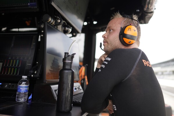 FILE - Felix Rosenqvist, of Sweden, sits in his pit box during a practice session for the IndyCar Indianapolis GP auto race at Indianapolis Motor Speedway, Friday, Aug. 11, 2023, in Indianapolis. IndyCar has issued six-position starting grid penalties to drivers Felix Rosenqvist, Marcus Amstrong and Pietro Fittipaldi ahead of Sunday’s, July 7, 2024, Indy 200 at Mid-Ohio Sports Car Course for their teams’ unapproved engine changes during last month’s test at Iowa Speedway.(AP Photo/Darron Cummings, File)