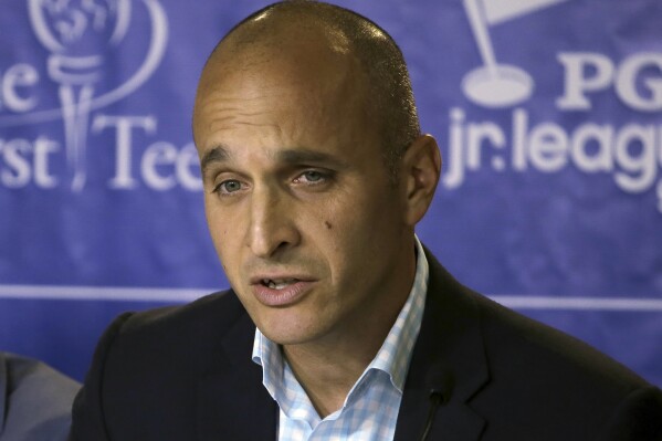 FILE - Pete Bevacqua, then-CEO of the PGA of America, gestures during a news conference at The Players Championship golf tournament, May 6, 2015, in Ponte Vedra Beach, Fla. (AP Photo/Chris O'Meara, File)