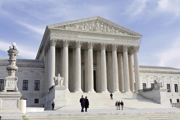 FILE - This photo shows the U.S. Supreme Court Building, Wednesday, Jan. 25, 2012 in Washington. A draft opinion circulated among Supreme Court justices suggests that a majority of high court has thrown support behind overturning the 1973 case Roe v. Wade that legalized abortion nationwide, according to a report published Monday night, May 2, 2022 in Politico. (AP Photo/J. Scott Applewhite, File)