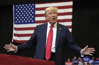 Republican presidential nominee former President Donald Trump arrives to speak at a campaign rally in Bozeman, Mont., Friday, Aug. 9, 2024. (AP Photo/Rick Bowmer)