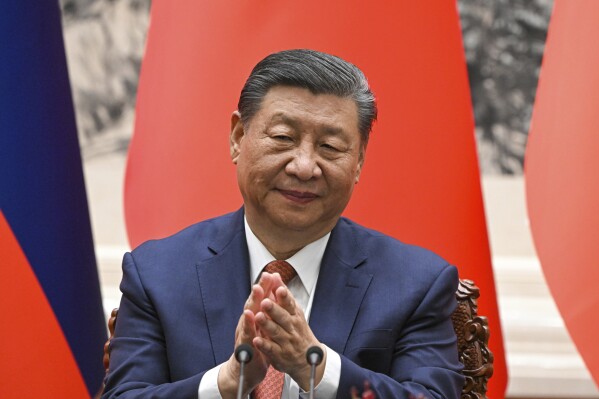 FILE - Chinese President Xi Jinping applauds during a signing ceremony at the Great Hall of the People in Beijing, China, on Thursday, May 16, 2024. China’s latest artificial intelligence chatbot is trained on President Xi Jinping’s doctrine, in a stark reminder of the ideological parameters that Chinese AI models should abide by. (Sergei Guneyev, Sputnik, Kremlin Pool Photo via AP, File)