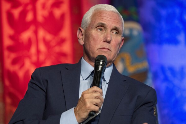 Republican presidential candidate and former Vice President Mike Pence attends an Associated Press 2024 GOP Presidential Candidates Conversations on National Security and Foreign Policy event, Tuesday, Oct. 3, 2023, held in partnership with Georgetown University's Institute of Politics and Public Service, at Georgetown University in Washington. (AP Photo/Jacquelyn Martin)