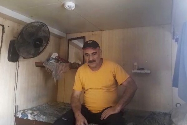 This image from video provided by Abdul Nasser Saleh shows him in his bedroom aboard the cargo ship Al-Maha at the seaport of Jeddah, Saudi Arabia, in January 2024. Saleh says he rarely got a good night’s sleep during the near-decade he spent working without pay on a cargo ship abandoned by its owner at ports along the Red Sea. (Courtesy Abdul Nasser Saleh via AP)