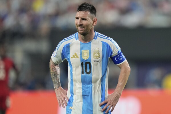 Argentina's Lionel Messi gestures during a Copa America semifinal soccer match against Canada in East Rutherford, N.J., Tuesday, July 9, 2024. (AP Photo/Julia Nikhinson)