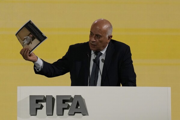 Palestinian Football Association leader Jibril Rajoub delivers his speech during the FIFA Congress in Bangkok, Thailand, Friday, May 17, 2024. (AP Photo/Sakchai Lalit)