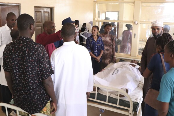 A patient injured in an explosion at a small hotel, receives treatment at a hospital in Mandera, Kenya, Monday, March. 25, 2024. Authorities in Kenya say that an explosion at a small hotel located near a police station in the northeast of the country has killed four people. Three of the victims were police officers. The blast in the town of Mandera on Monday wounded several others. (AP Photo/Omar Noor)