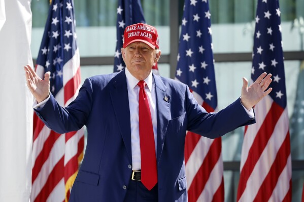 Former President Donald Trump enters a campaign event, June 18, 2024, in Racine, Wis. (AP Photo/Jeffrey Phelps, File)