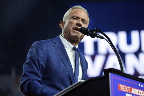 FILE - Independent presidential candidate Robert F. Kennedy Jr. speaks as he endorses Republican presidential nominee former President Donald Trump at a campaign rally at the Desert Diamond Arena, Friday, Aug. 23, 2024, in Glendale, Ariz. (AP Photo/Evan Vucci)