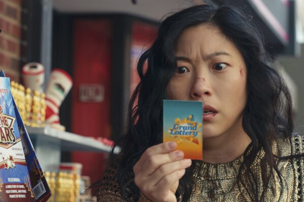 This image released by Prime Video shows Awkwafina in a scene from "Jackpot!" (Prime Video via AP)