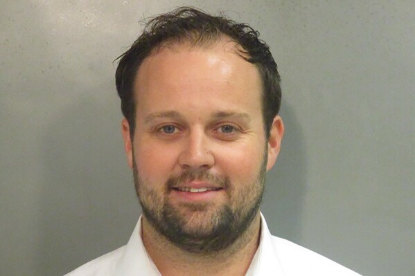 FILE - This undated photo provided by Washington County, Ark., Detention Center shows Josh Duggar. The Supreme Court has rejected an appeal from Josh Duggar, a former reality television star convicted of downloading child sexual abuse images. Duggar was on the TLC show “19 Kids and Counting” with his large family before his 2021 conviction. (Washington County Detention Center via AP, File)