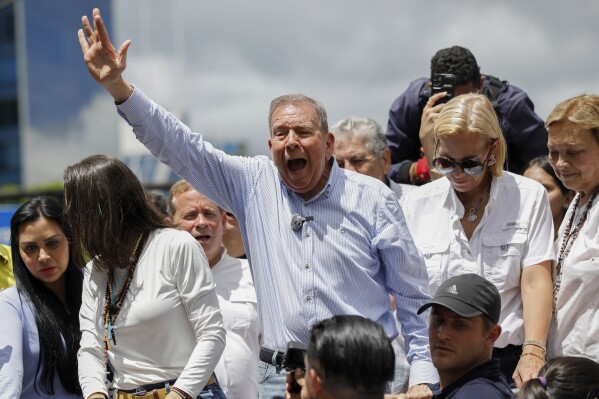 Opposition presidential candidate Edmundo Gonzalez leads a demonstration against the official election results that declared that President Nicolas Maduro won reelection in Caracas, Venezuela, Tuesday, July 30, 2024. (AP Photo/Cristian Hernandez)