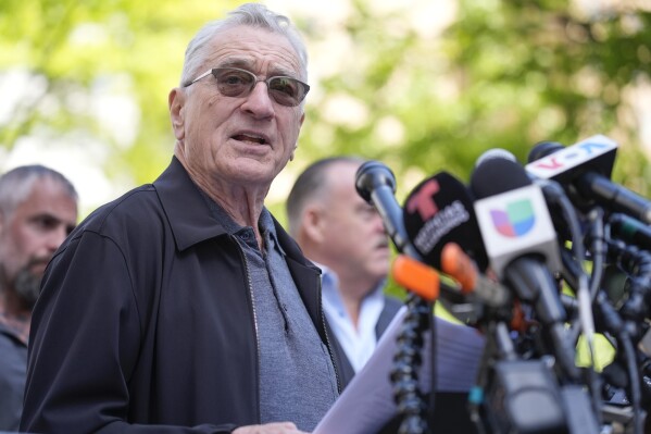 Former Capitol police officer Harry Dunn speaks to reporters in support of President Joe Biden across the street from former President Donald Trump's criminal trial in New York, Tuesday, May 28, 2024. (AP Photo/Seth Wenig)