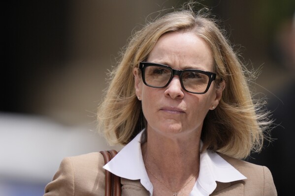 Kathleen Buhle, Hunter Biden's ex-wife, departs from federal court, Wednesday, June 5, 2024, in Wilmington, Del. (AP Photo/Matt Rourke)