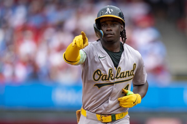 Oakland Athletics' Lawrence Butler reacts to his two-run home run during the fifth inning of a baseball game against the Philadelphia Phillies, Sunday, July 14, 2024, in Philadelphia. (AP Photo/Chris Szagola)