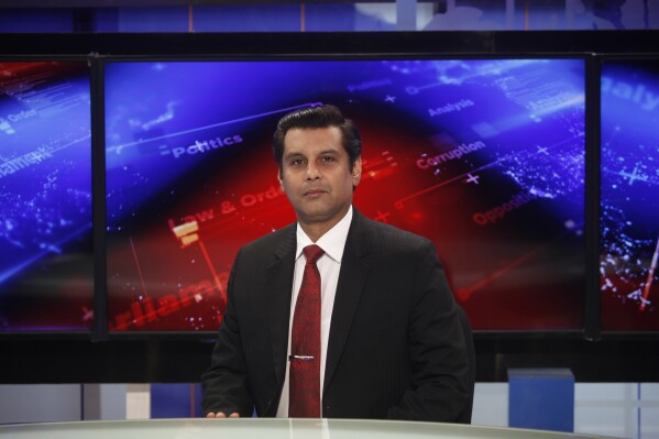 FILE - Senior Pakistani journalist Arshad Sharif poses for a photograph prior to recording an episode of his talk show at a studio in Islamabad, Pakistan, on Dec. 15, 2016. A Kenyan court on Monday, July 8, 2024, ruled that the 2022 shooting death of the Pakistani journalist by police in Nairobi was unlawful and unconstitutional, a lawyer and his family said. (AP Photo, File)