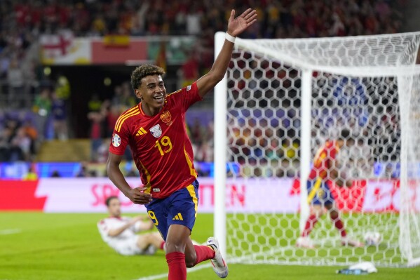 FILE - Spain's Lamine Yamal celebrates a goal that was disallowed for an offside during a round of sixteen match between Spain and Georgia at the Euro 2024 soccer tournament in Cologne, Germany, Sunday, June 30, 2024. Euro 2024 takeaways: Lamine Yamal shines and fans party but the big names struggle. (AP Photo/Manu Fernandez, File)