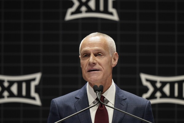 FILE - Big 12 Commissioner Brett Yormark addresses the media, Oct. 17, 2023, in Kansas City, Mo. (AP Photo/Charlie Riedel, File)