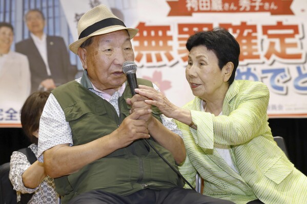 Former Japanese death-row inmate Iwao Hakamada, left, and his sister Hideko Hakamada attend a gathering of supporters in Shizuoka, central Japan on Oct. 14, 2024. (Kyodo News via AP)