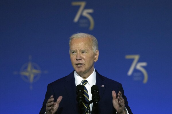 President Joe Biden speaks during an event commemorating the 75th Anniversary of NATO at the Andrew W. Mellon Auditorium on the sidelines of the NATO summit in Washington on Tuesday, July 9, 2024. (AP Photo/Susan Walsh)