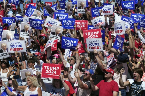 Supporters cheer as Republican presidential candidate former President Donald Trump arrives at a campaign rally in Chesapeake, Va., Friday, June 28, 2024. (AP Photo/Steve Helber)