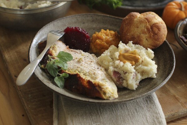 FILE - A dish with roast turkey breast is photographed in Concord, N.H., on Sept. 28, 2015. (AP Photo/Matthew Mead, File)