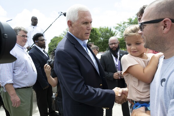 FILE - Former Vice President Mike Pence meets with supporters after speaking at the National Celebrate Life Rally at the Lincoln Memorial on June 24, 2023, in Washington. Pence is leaning in on his anti-abortion stance as he campaigns for the Republican presidential nomination. Pence says he does not support exceptions in the case of nonviable pregnancies, when doctors have determined there is no chance a baby will survive outside the womb.(AP Photo/Kevin Wolf, File)