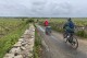 Cyclists ride on the Voie des Vignes a little south of Beaune, in the Burgundy region of France. (Steve Wartenberg via AP)