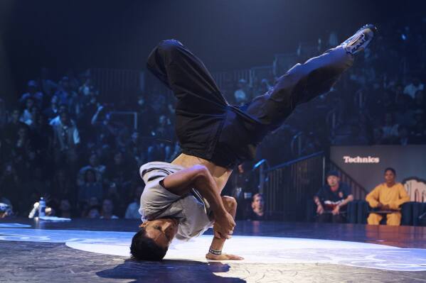 FILE - Victor Montalvo, also known as B-Boy Victor, of the United States, competes in the B-boy Red Bull BC One World Final at Hammerstein Ballroom, Saturday, Nov. 12, 2022, in New York. “I’m really excited to represent a whole country, but I’m more excited to represent my dance, my artform and I’m super excited to bring the hip-hop culture to the Olympics,” Montalvo. (AP Photo/Andres Kudacki, File)