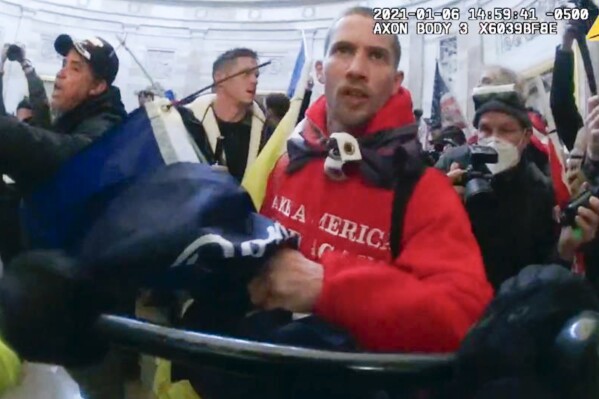 This image from video from police-worn body camera and contained in the sentencing memorandum from the Justice Department, shows John George Todd III in the Rotunda of the U.S. Capitol on Jan. 6, 2021, in Washington. (Justice Department via AP)