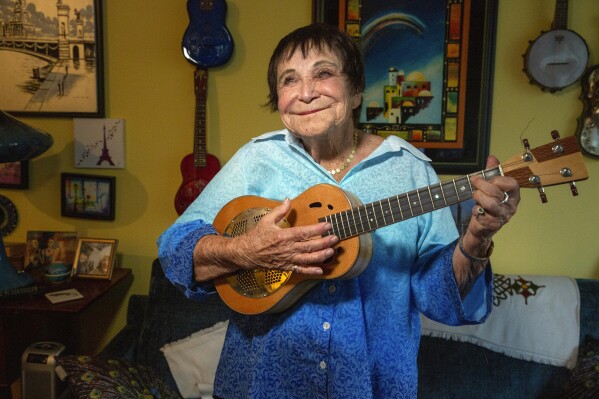 D'yan Forest, 89, who holds the Guinness World Record for Oldest Working Female Comedian, poses in her apartment, Thursday, July 19, 2024, in New York.