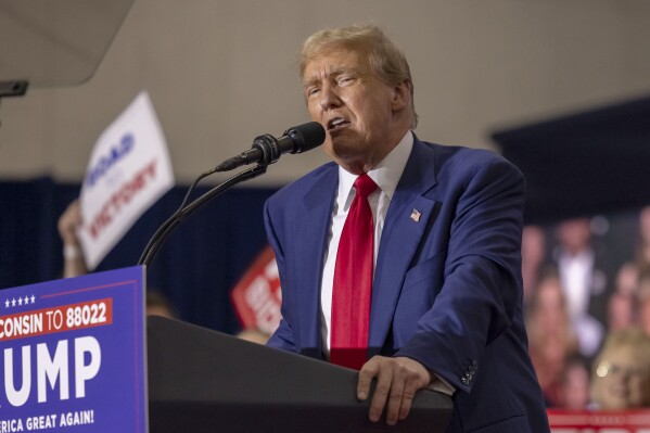 FILE - Republican presidential candidate former President Donald Trump speaks April 2, 2024, at a rally in Green Bay, Wis. Trump is accusing Joe Biden of offering a weak response to antisemitism, wielding the clashes on colleges campuses over the war in Gaza as a campaign issue. But Trump’s attacks ignore his own long history of rhetoric that invokes the language of Nazi Germany and plays on stereotypes of Jews and politics. (AP Photo/Mike Roemer, File)